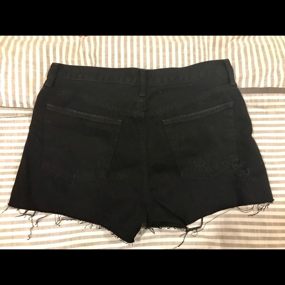 Free people black denim distressed shorts